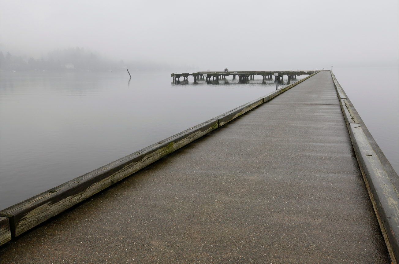 Foggy morning dock on the water in Bothell, Washington