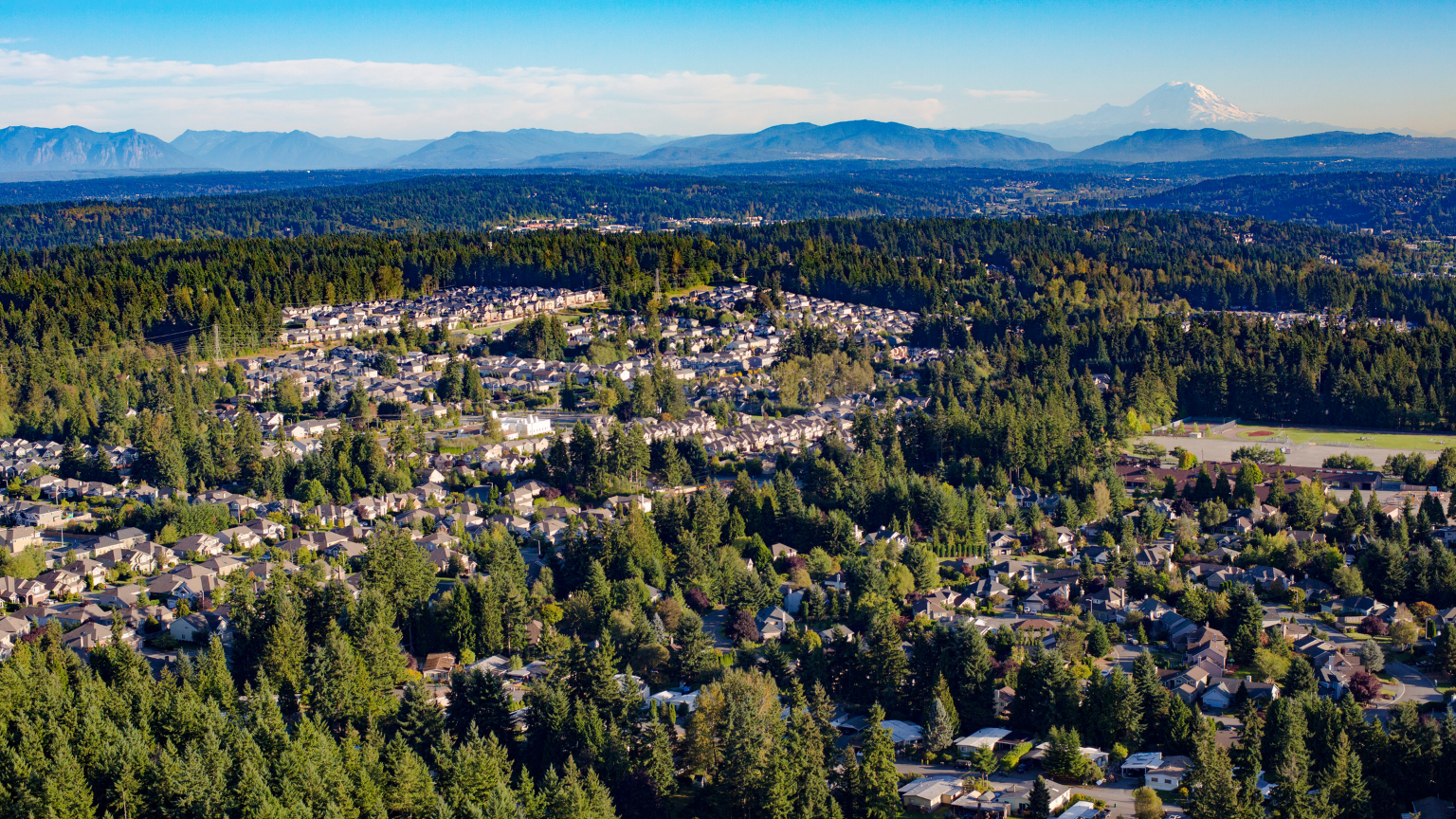 Aerial view of Bothell neighborhoods surrounded by Pacific Northwest forest